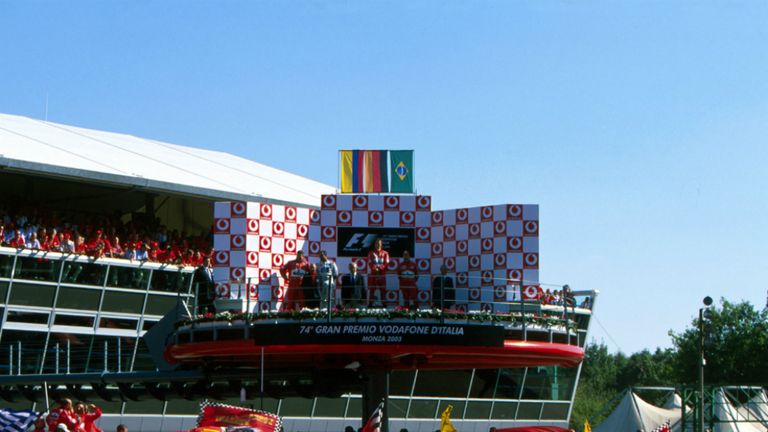 Michael Schumacher celebrates his 2003 victory in front of the Tifosi
