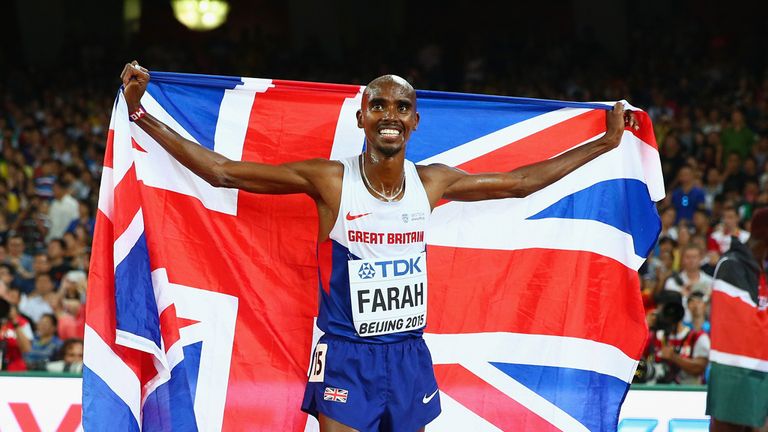 Farah celebrates his latest victory with the British flag
