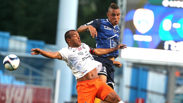 Troyes forward Perea Vargas (right) battles with Montpellier defender Vitorino Hilton