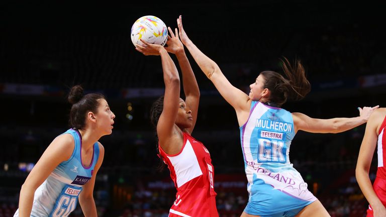 Pamela Cookey of England is challenged by Hayley Mulheron of Scotland during the 2015 Netball World Cup match between England and Scotland 