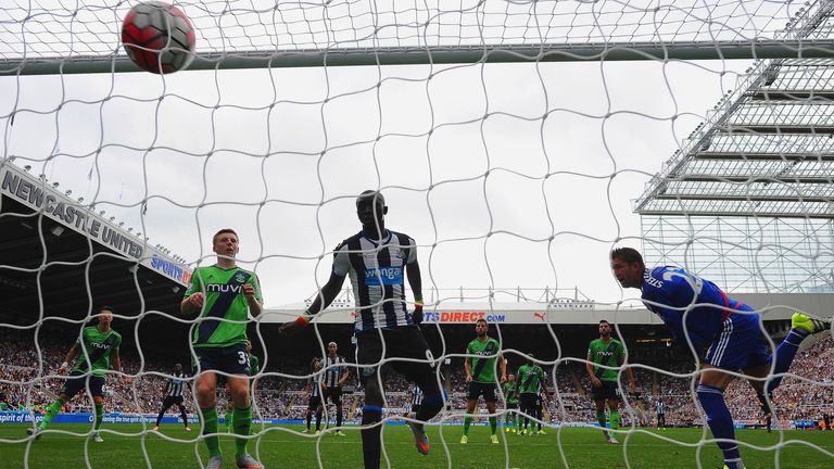 Papiss Demba Cisse scores the equaliser for Newcastle