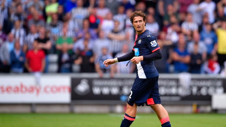  Daryl Janmaat of Newcastle United walks off the pitch after receiving a red card against Swansea