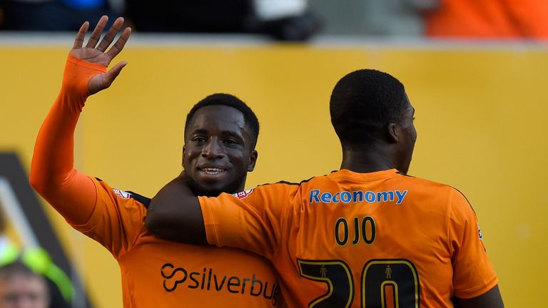 WOLVERHAMPTON, ENGLAND - AUGUST 11:  Wolves striker Nouha Dicko (l) celebrates after scoring the first Wolves goal during the Capital One Cup First Round m