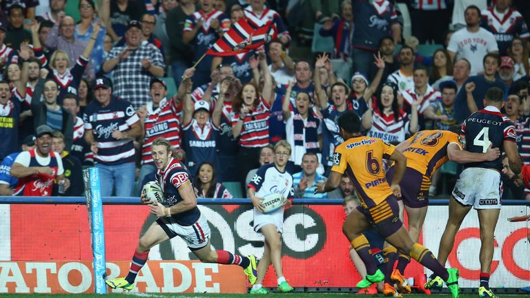 Brendan Elliot of the Roosters crosses to score a try during theNRL match between the Roosters and the Broncos