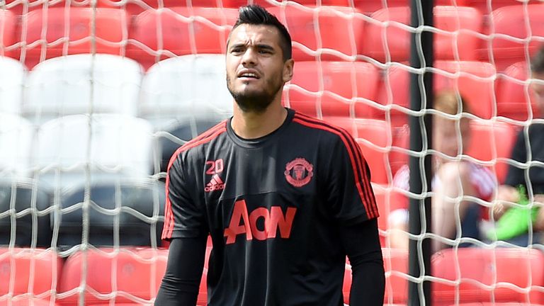Manchester United goalkeeper Sergio Romero warms up before the match with Tottenham at Old Trafford