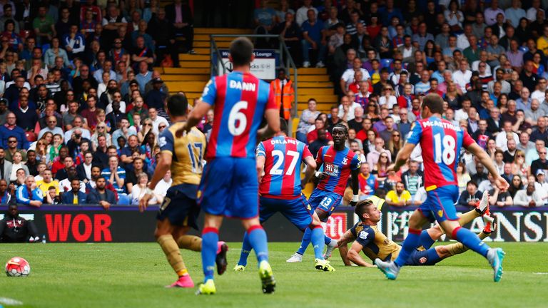 Olivier Giroud (grounded, right) hooks Arsenal in front at Crystal Palace