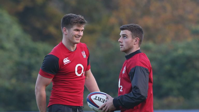 BAGSHOT, ENGLAND - NOVEMBER 19:  George Ford (R) looks on with Owen Farrell during the England training session held at Pennyhill Park on November 19, 2014