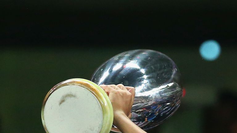 Pedro of Barcelona lifts the UEFA Super Cup