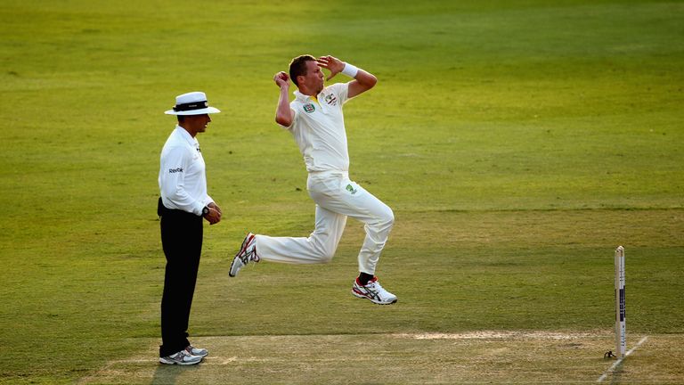 ABU DHABI, UNITED ARAB EMIRATES - OCTOBER 30:  Peter Siddle of Australia bowls during day one of the second test between Pakistan and Australia at Sheikh Z
