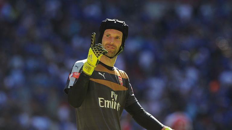 Arsenal goalkeeper Petr Cech celebrates after the Community Shield