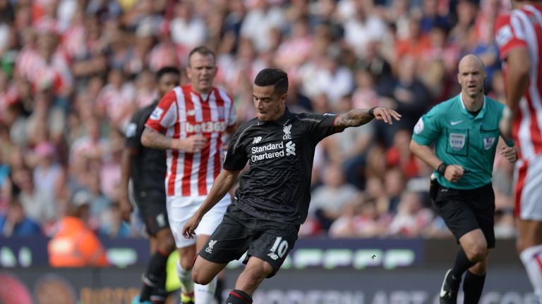 Liverpool's Philippe Coutinho shoots to score the winning goal with a trademark long-range strike in the 86th minute