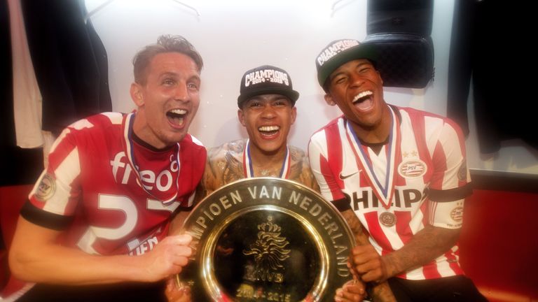 PSV Eindhoven players players Luuk de Jong, Memphis Depay and Georgino Wijnaldum celebrate after PSV secured their 2014-2015 Eredivisie title