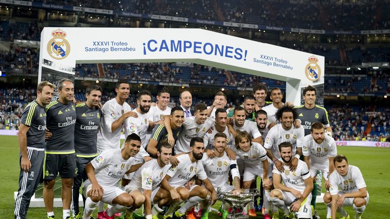 Real Madrid's players pose as they celebrate their victory over Galatasaray 