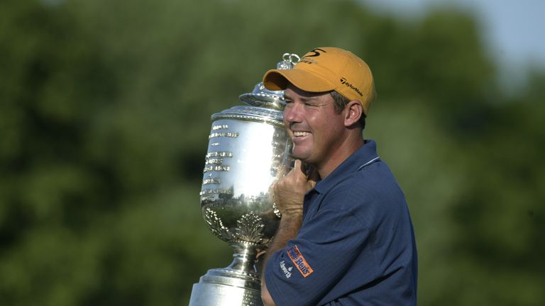 Rich Beem poses for photographers after winning the US  PGA Championship 