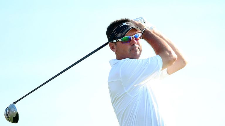 Rich Beem of the United States watches his tee shot on the fourth hole during the second round of the 2015 PGA Championship