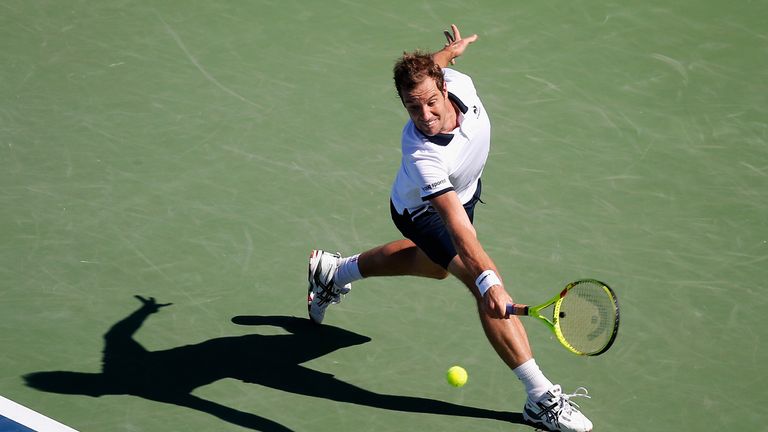 Richard Gasquet of France returns a shot to Andy Murray of Great Britain during the Western & Southern Open at the Linder Fami