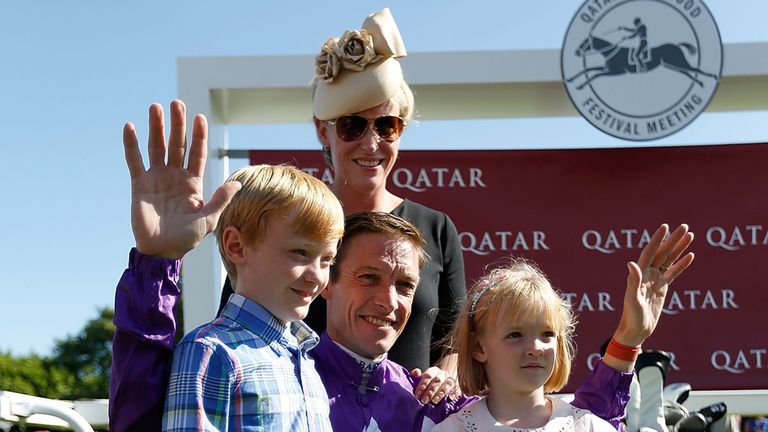 Retiring jockey Richard Hughes with wife Lizzie, daughter Phoebe and son Harvey