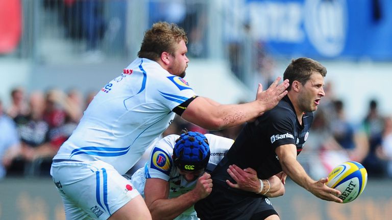 Richard Wigglesworth of Saracens is tackled by Tomas Francis of Exeter Chiefs
