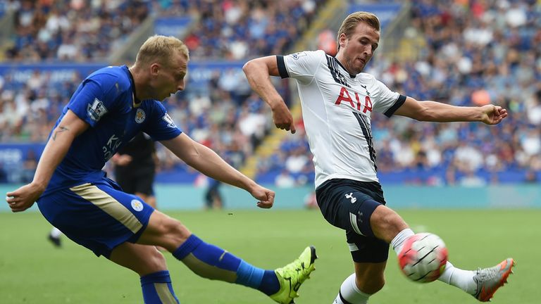 Ritchie De Laet of Leicester City and Harry Kane of Tottenham Hotspur compete for the ball 