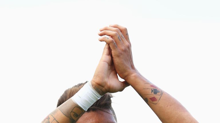 STOKE ON TRENT, ENGLAND - AUGUST 09:  Roberto Firmino of Liverpool applauds the crowd after the Barclays Premier League match between Stoke City and Liverp