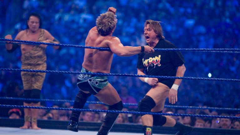 'Rowdy' Roddy Piper (right) battles against Chris Jericho battles during  WrestleMania 25