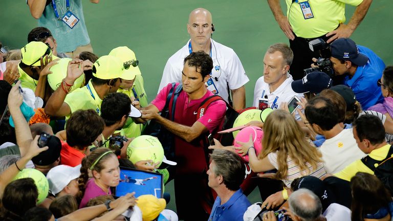 Federer delighted his army of fans by signing autographs after the match