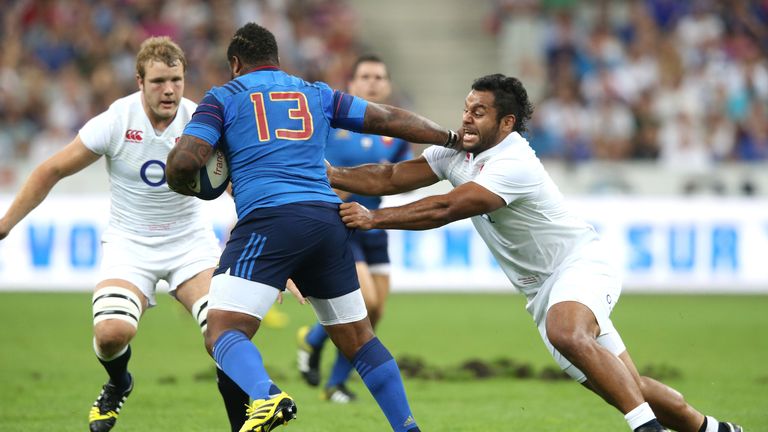 Mathieu Bastareaud of France is tackled by Billy Vunipola