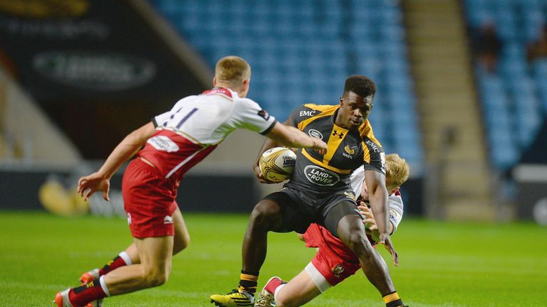 Christian Wade of Wasps breaks through a tackle during the Singha Premiership Rugby 7s Series