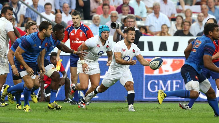 England scrum-half Danny Care passes the ball during their defeat in Paris