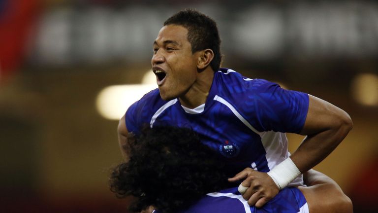 Fa'atoina Autagavaia celebrates scoring Samoa's opening try against Wales in 2012