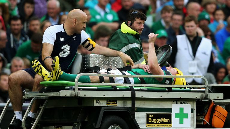 Ireland's Keith Earls gives the thumbs up as he's stretchered from the pitch