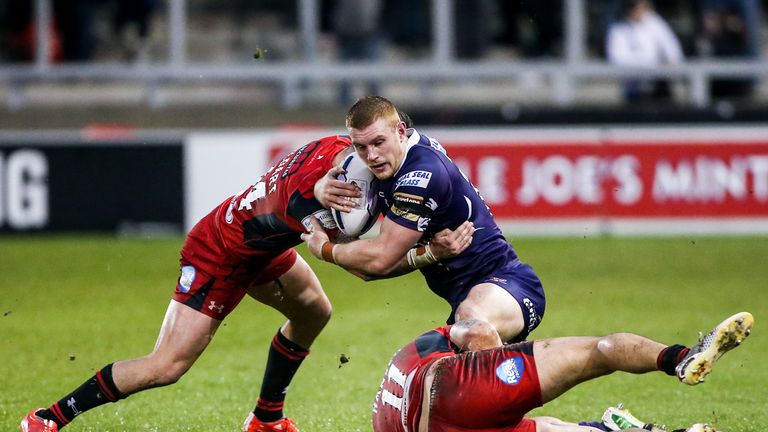 Jack Hughes (middle) is heading to Warrington for the 2016 Super League season