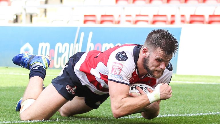Leigh's Liam Kay scores a try against Wakefield
