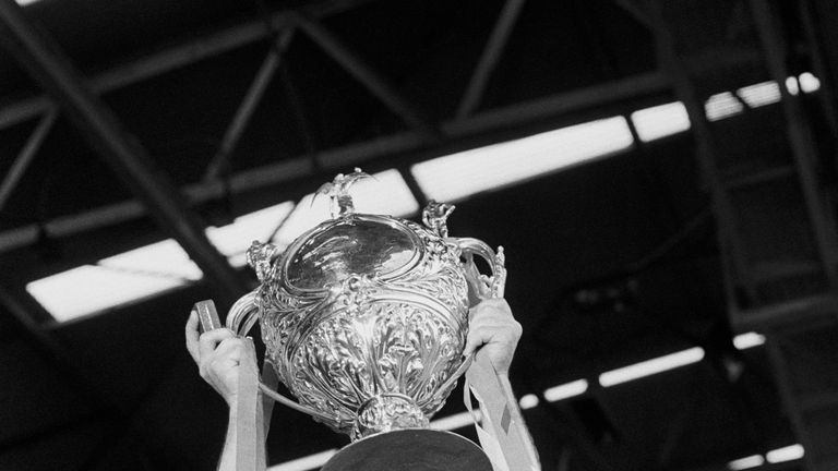 Hull KR captain Roger Millward lifts the Challenge Cup after his team's 10-5 victory over Hull in 1980