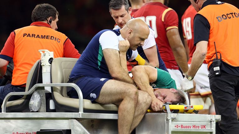 Ireland's flanker Tommy O'Donnell is stretchered off against Wales
