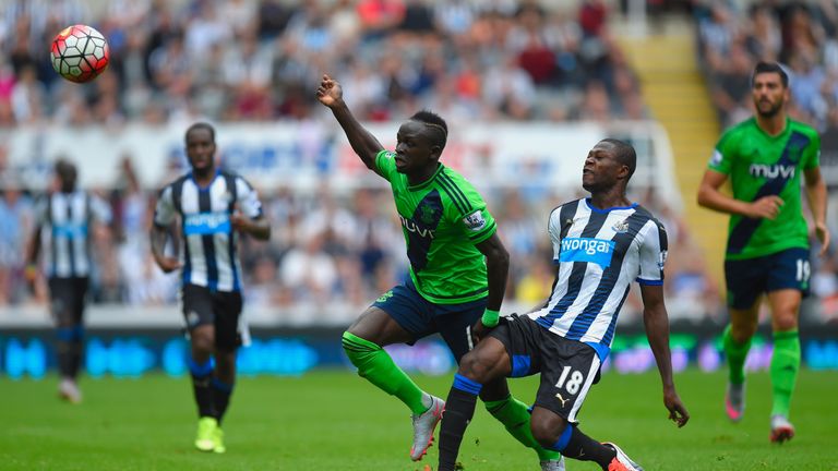 Sadio Mane of Southampton is challenged Chancel Mbemba of Newcastle United