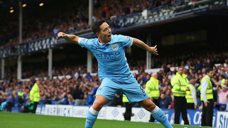 Samir Nasri celebrates scoring against Everton