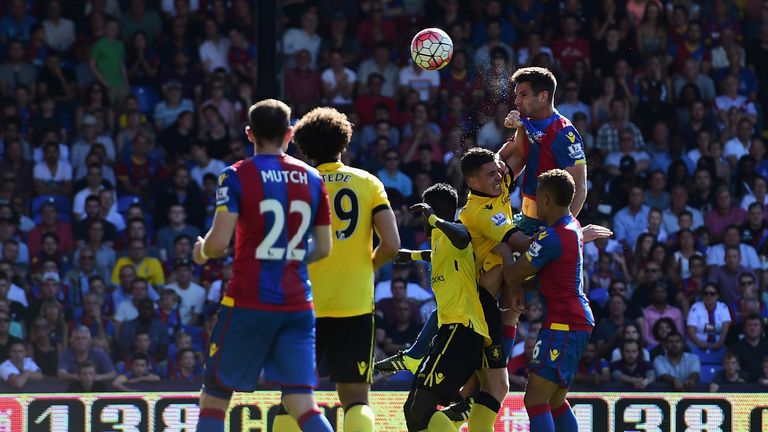 Scott Dann of Crystal Palace heads to score his team's first goal against Aston Villa