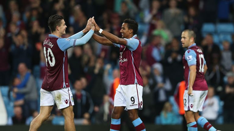 Scott Sinclair (C) of Aston Villa celebrates scoring his hat trick with Jack Grealish during the Capital One Cup second round