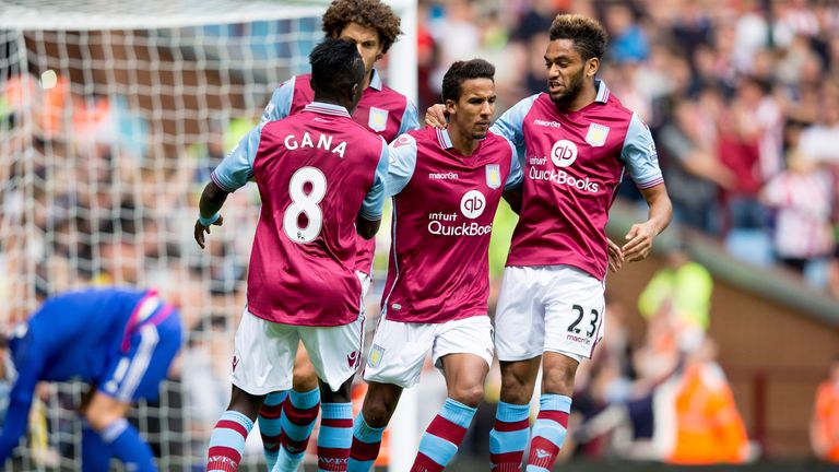 Scott Sinclair of Aston Villa celebrates with his team-mates after scoring their first goal against Sunderland 