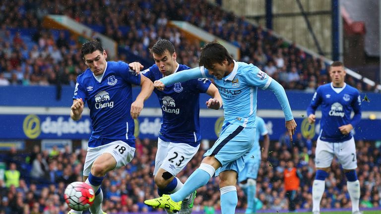 David Silva shoots against the post as he is closed down by Gareth Barry and Seamus Coleman