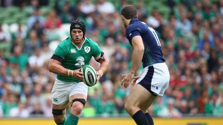Sean O'Brien of Ireland runs at Tim Visser of Scotland during the International match between Ireland and Scotland