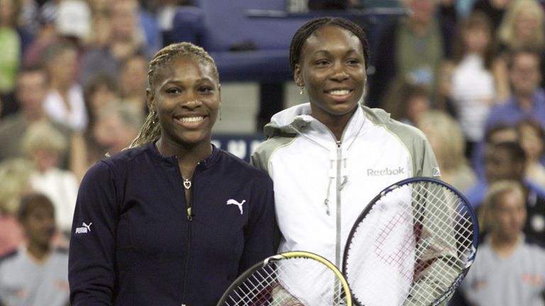8 Sep 2001: Serena Williams and Venus Williams of the USA pose at the net before the women's final match of the US Open at the USTA National Tennis Center 