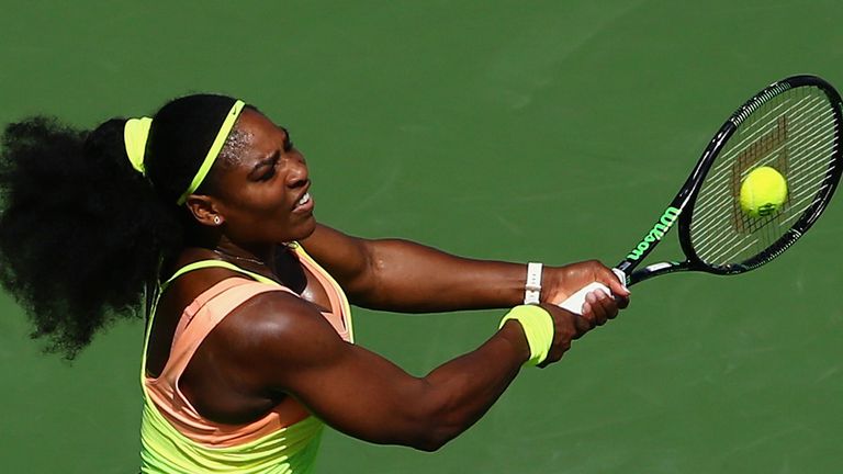 Serena Williams returns a backhand to Karin Knapp of Italy during their match on Day 5 of the Western & Southern Open in Cincinnati