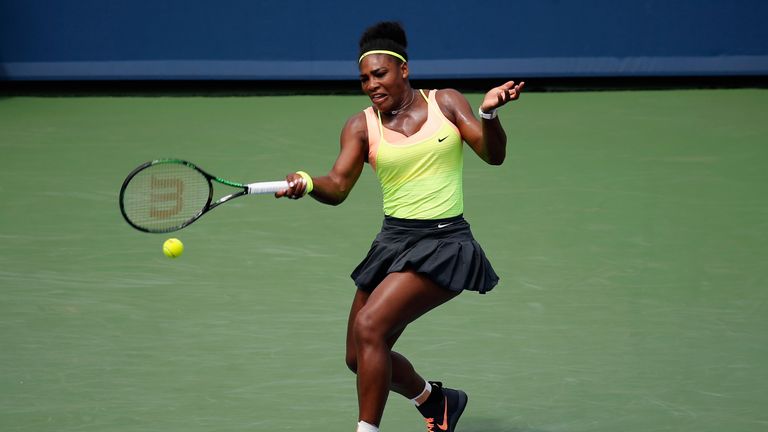 Serena Williams returns a shot to Tsvetana Pironkova of Bulgaria
