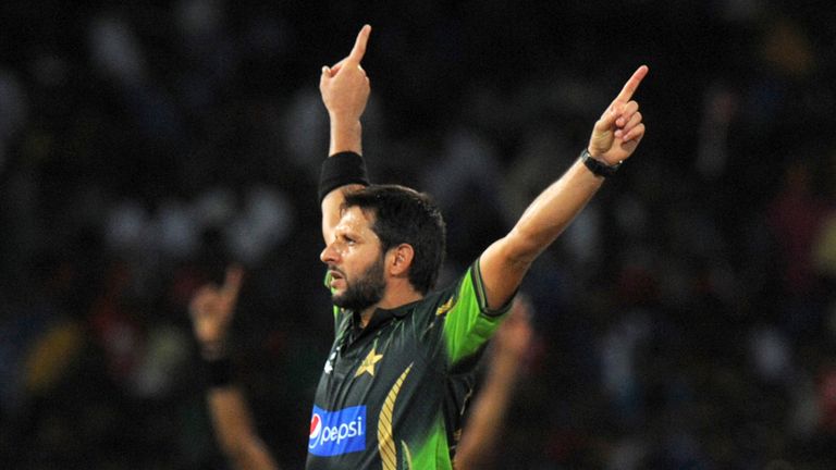 Pakistan cricketer Shahid Afridi celebrates after he dismissed Sri Lankan cricketer Dhananjaya de Silva