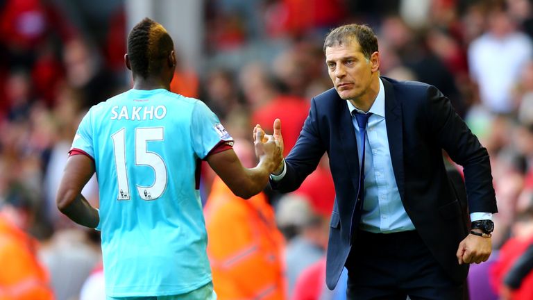 Slaven Bilic congratulates Diafra Sakho after the forward had put West Ham 3-0 up at Liverpool