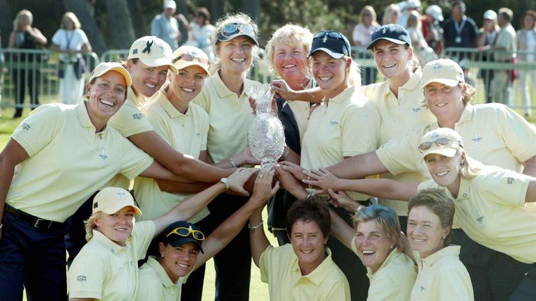 The European team celebrates with the trophy after winning the Solheim Cup against The United States at Barseback Golf & Country Club in Loddekopinge, Swed