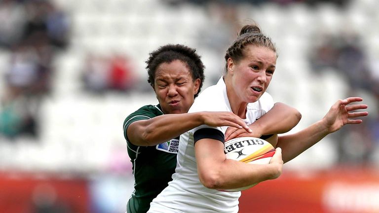 Ireland's Sophie Spence lays down a tackle on England's Emily Scarratt during Women's Rugby World Cup