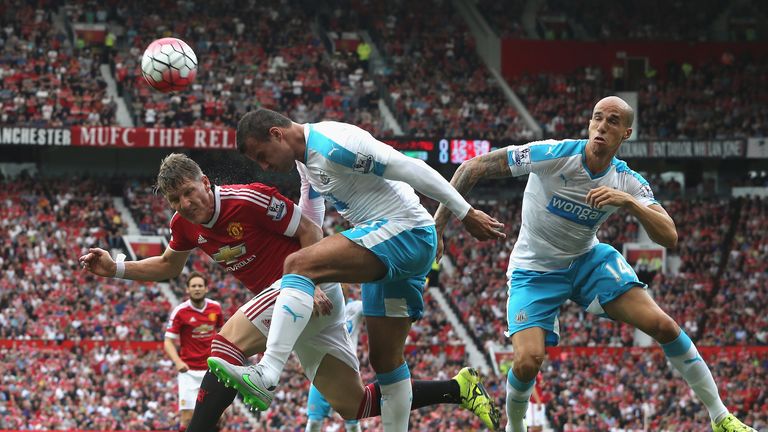 Steven Taylor and Gabriel Obertan compete with Bastian Schweinsteiger